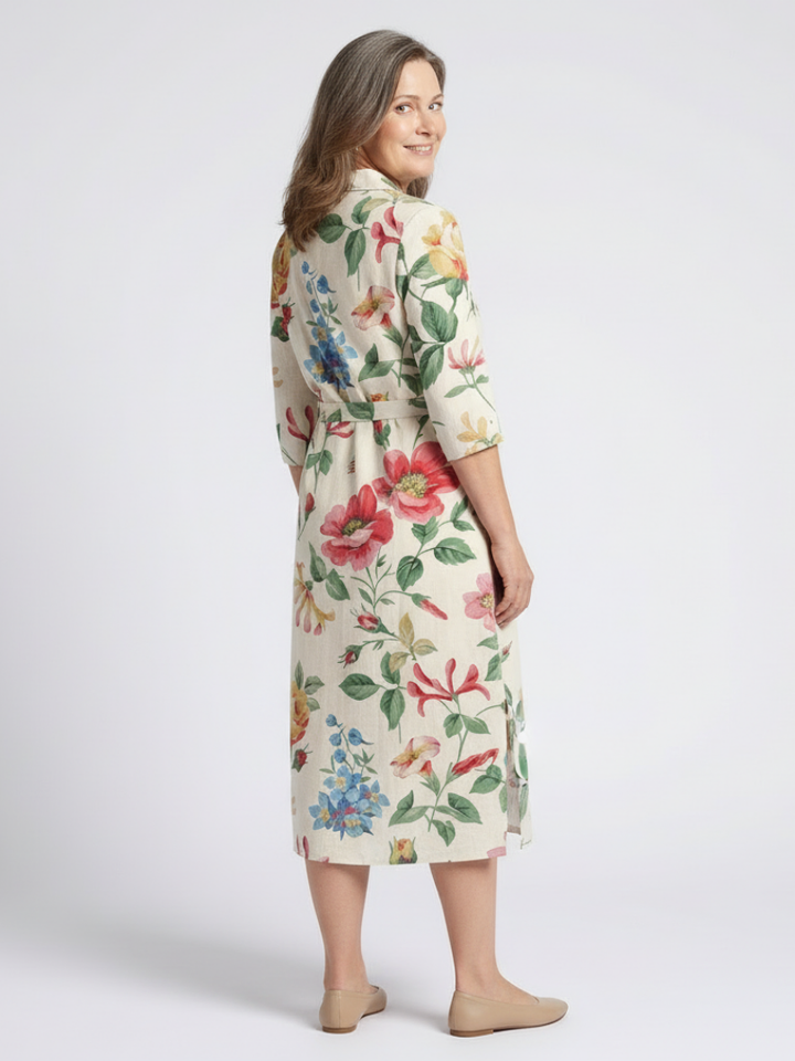 Charlotte | Midi-mekko kukilla ja lyhyillä hihoilla napilla