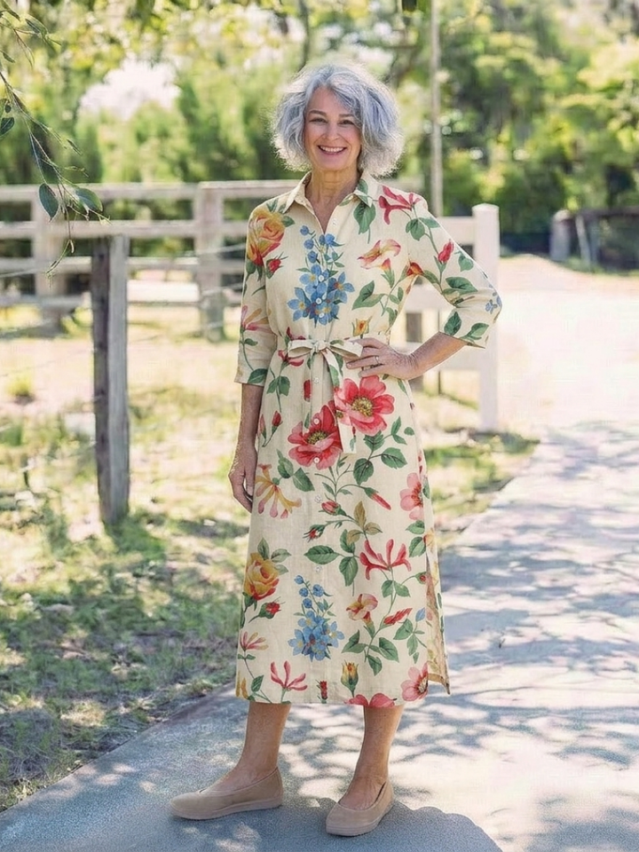 Charlotte | Midi-mekko kukilla ja lyhyillä hihoilla napilla